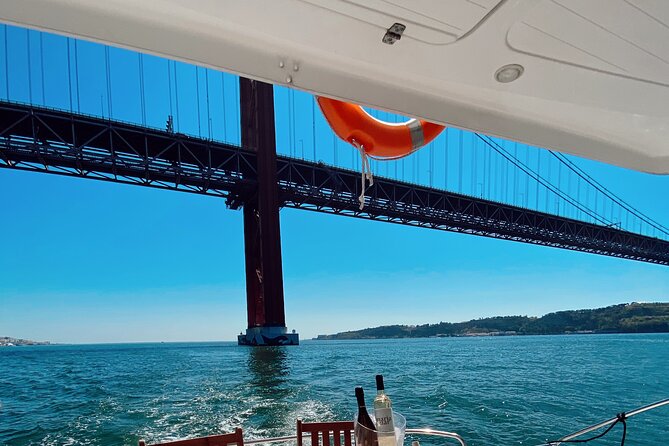 2H Lisbon Private Luxury Catamaran Tour with Welcome Drink - A grand plaza seen from the Tagus