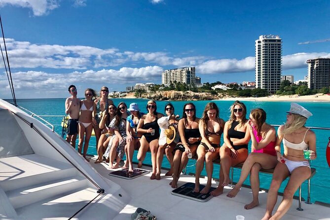 5 Hour Luxury Catamaran Day Sail in Sint Maarten on The Phoenix - Maho Beach by boat, with planes overhead