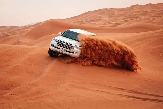 6-Hour Luxury Evening Dubai Desert Safari - BBQ Dinner Live Shows - Dune bashing in a 4x4 Land Cruiser