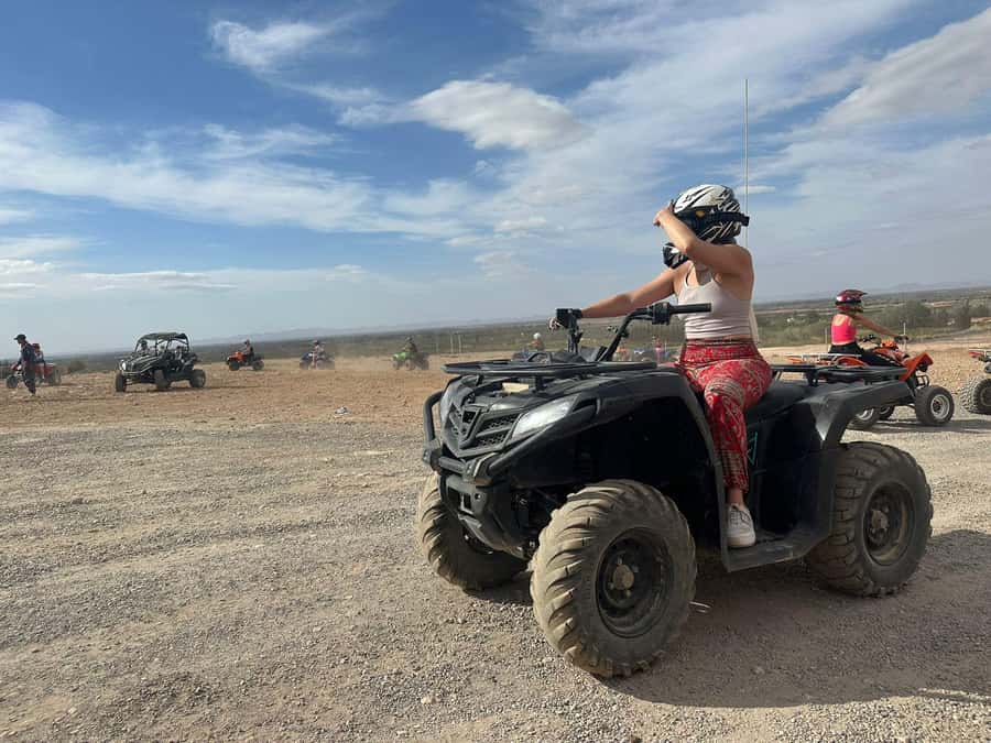 Agafay Desert Luxury Package Quad, Camel, Pool & Dinner Show - Blue robes and a 30-minute camel ride
