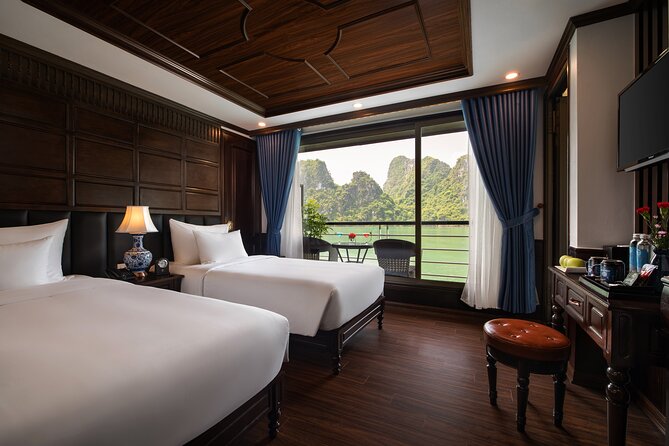 All-Inclusive 3 Day/2 Night Halong Luxury Cruise Meals, Cave, Kayaking, Swimming - Day three: kayaking through a quiet lagoon