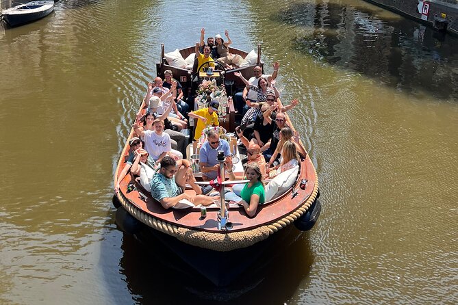 Amsterdam Luxury Boutique Boat tour with Unlimited Beer and Wine - Oude Kerk and the oldest part of the city