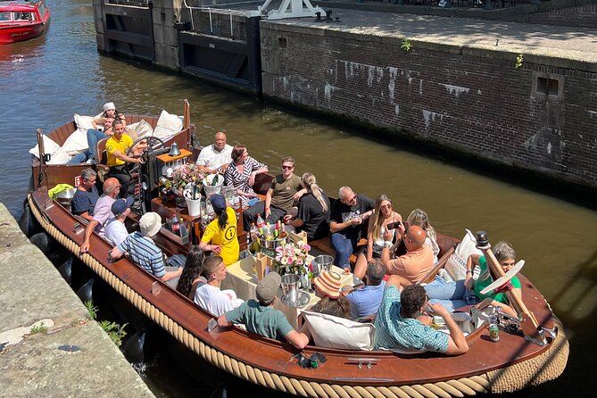 Amsterdam Luxury Boutique Boat tour with Unlimited Beer and Wine - The Skinny Bridge and the ride back