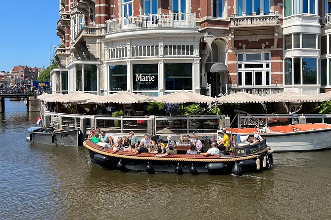 Amsterdam Luxury Boutique Boat tour with Unlimited Beer and Wine - Boat comfort and weather concerns