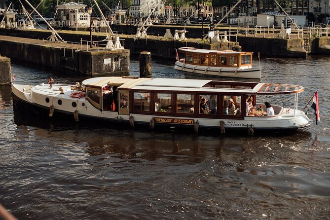 Amsterdam: Luxury Saloon Boat Cruise with Cocktails & Waffle - What the hour on board feels like