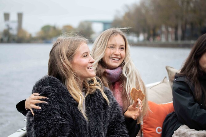 Amsterdam: Luxury Saloon Boat Cruise with Cocktails & Waffle - The Amstel, Skinny Bridge, and the best photo moments