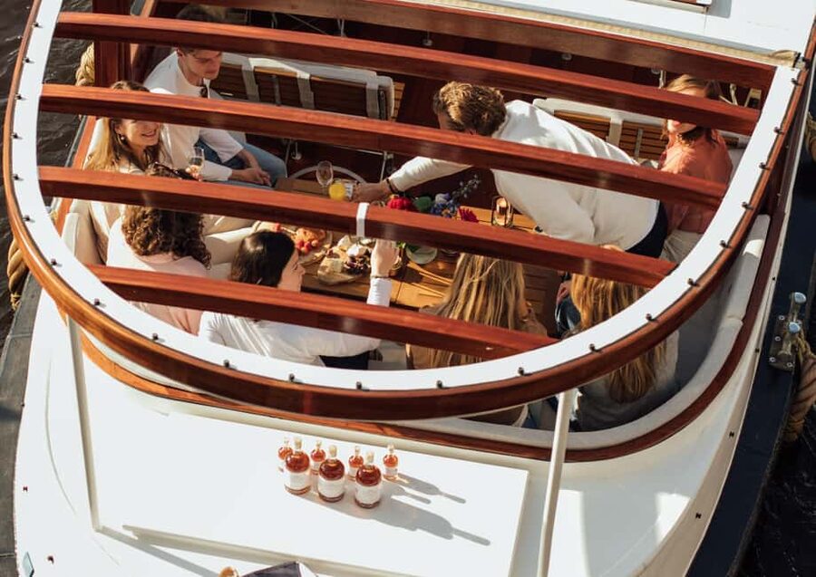 Amsterdam: Luxury Saloon Boat Cruise with Cocktails & Waffle - Weather, meeting points, and comfort