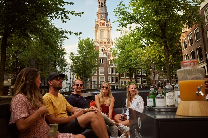 Amsterdam: Saloon Boat Cruise + Unlimited Drinks & Bite option - Zuiderkerk, Stopera, and the city’s changing skyline