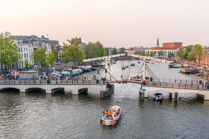 Amsterdam: Saloon Boat Cruise + Unlimited Drinks & Bite option - Guide quality makes the biggest difference