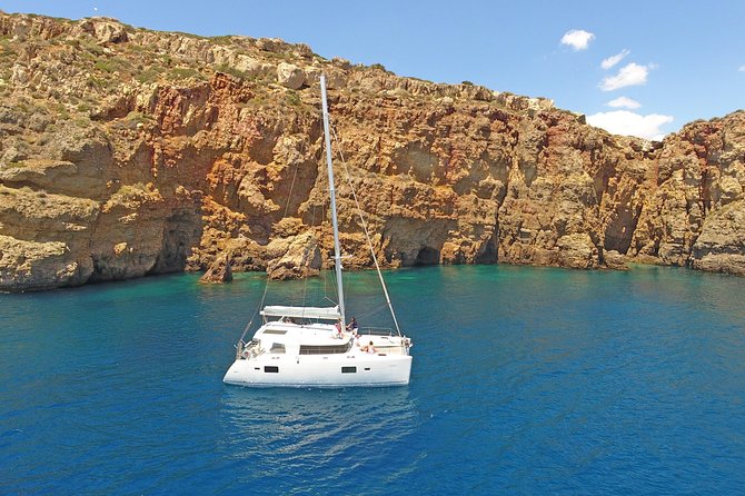 Athens Private Luxury Catamaran Cruise with Traditional Greek Meal and BBQ - The first swim stop and the Athens Riviera views