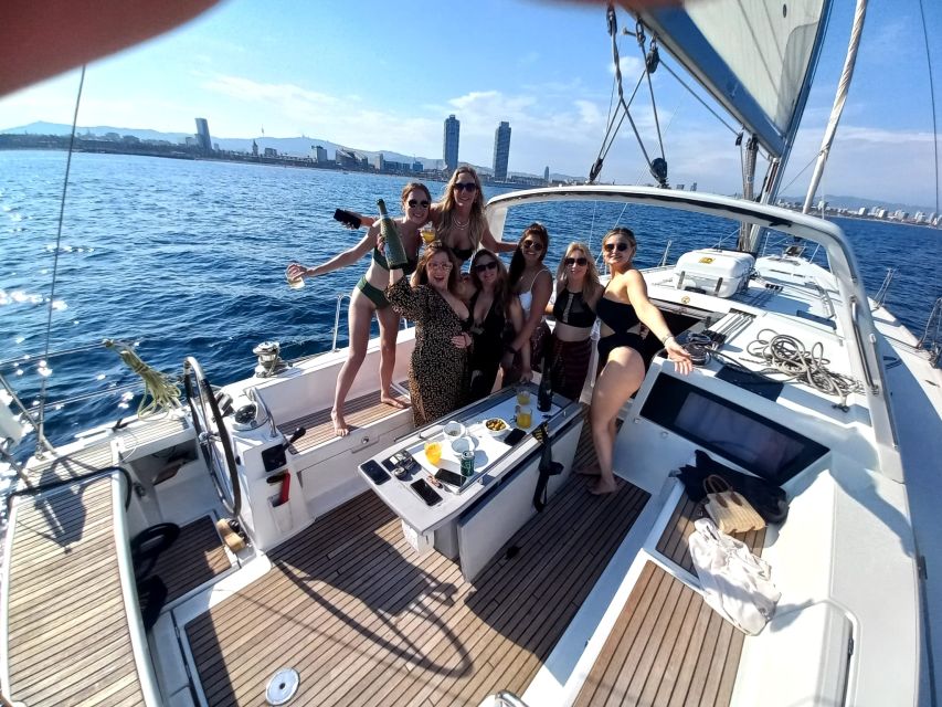 Barcelona: Luxury Private Sunset Yacht Cruise - Leaving Port Olimpic as Barcelona lights up