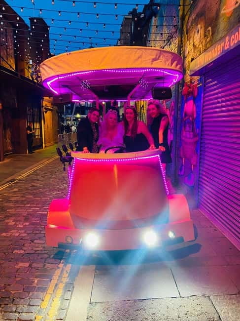 Belfast: Luxury Pink Hen Party Bike Tour (BYOB) - Cathedral Quarter atmosphere, with music instead of a lecture