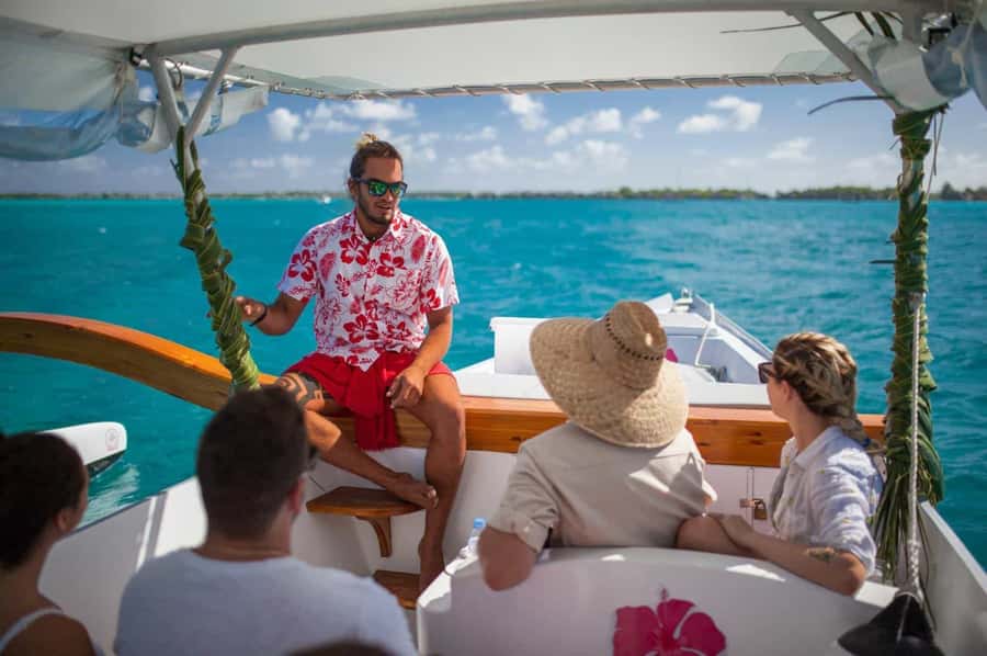 Bora Bora Luxury Tour and Beach Picnic - Sharks and stingrays in shallow lagoon water