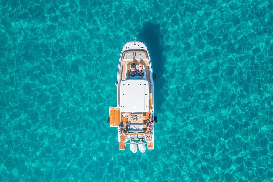 Cagliari: Luxury Motorboat Tour with 3 Swim Stops & Wine - What to pack for three hours on the water