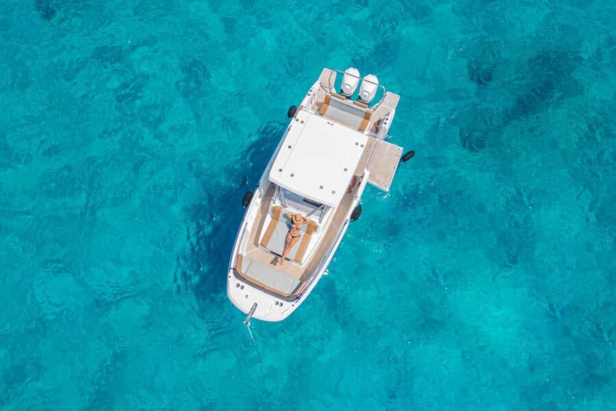 Cagliari: Luxury Motorboat Tour with 3 Swim Stops & Wine - Cala Mosca: the first chance to swim