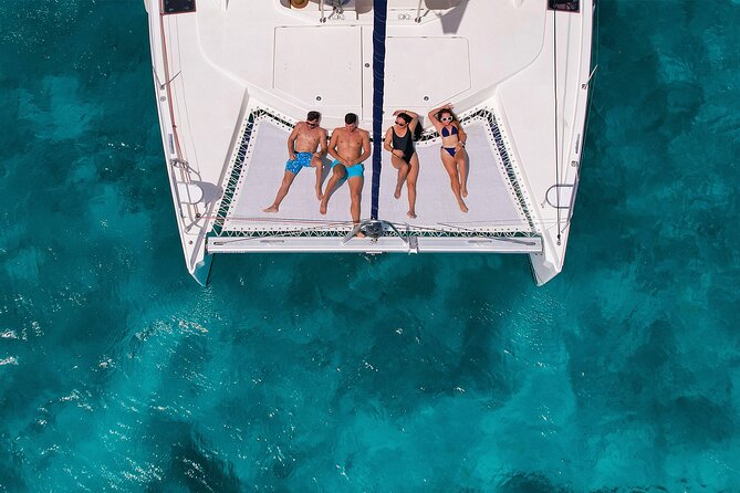 Cozumel Luxury Sailing & Snorkeling with Lunch and Open Bar Onboard - Boarding the catamaran and finding your pace
