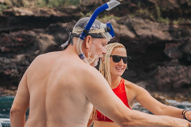 Deluxe Snorkel & Dolphin Watch Aboard a Luxury Catamaran from Kailua-Kona - The real value of $183.77