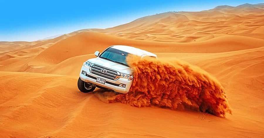 Desert Safari - Private 4WD car - Red dunes, private wheels, and a clear split in quality