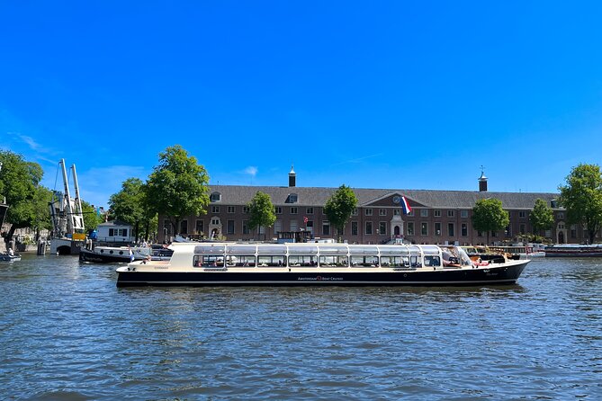 Discover Amsterdam: Luxury Canal Cruise with a Local Skipper - Passing the Anne Frank House and Westerkerk