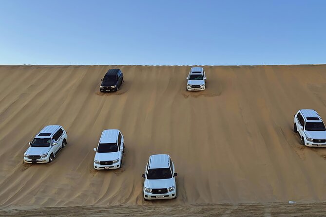 Doha: Luxury Desert Safari, Quad Bike & Sandboarding - From Doha to the open desert