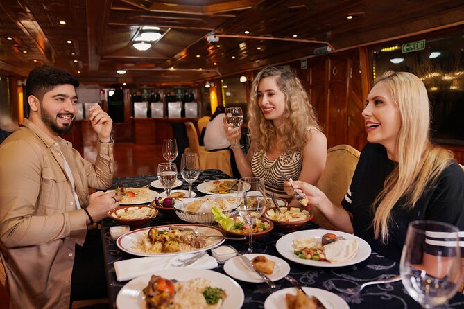 Dubai Creek Luxury Dhow Dinner Cruise with Optional Transfer - A gentle cruise through old Dubai after dark