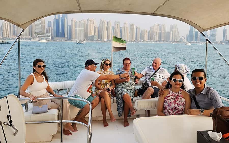 Dubai: Luxury Sunset Yacht Tour with Snacks and Drinks - Sunset, food, and the difference between meal options