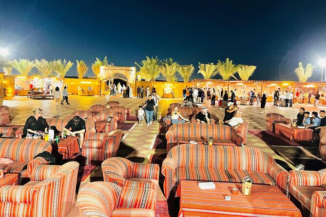 Dubai Premium Desert Safari – Live Buffet Dinner & Luxury Camp - Sandboarding and the sunset photo stop