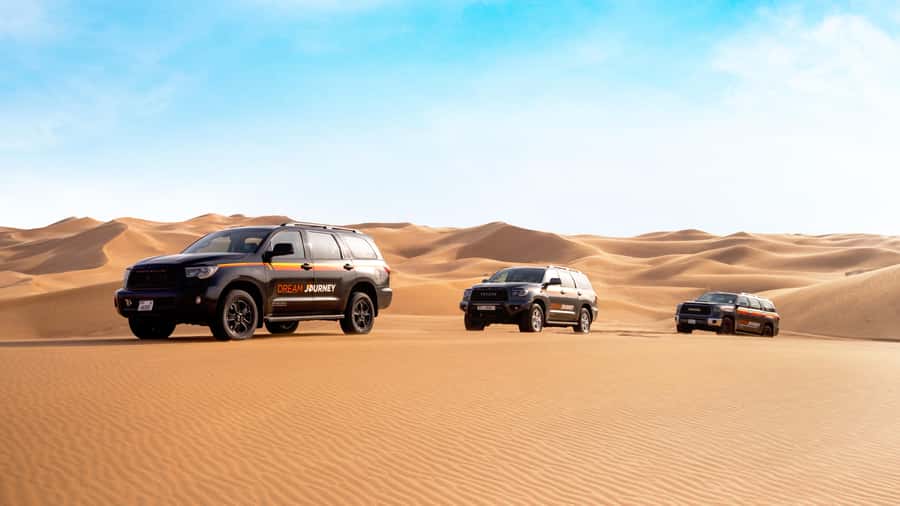 Dubai Waves & Dunes: Luxury Yacht Cruise w/ Red Dunes Safari - From hotel pickup to Lahbab’s red dunes