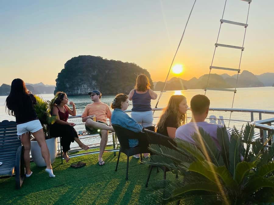 From Hanoi: Ha Long Bay Luxury Day Cruise with Food & Kayak - Titop Island for a climb, a swim, or both