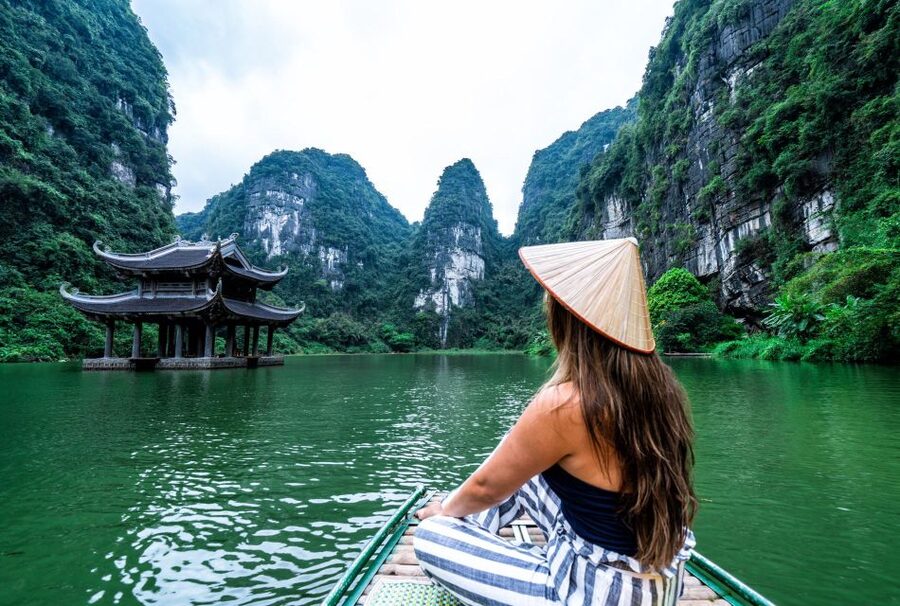 From Hanoi: Hoa Lu-Trang An-Mua Cave Luxury Trip w/Limousine - A short bicycle ride through a local village