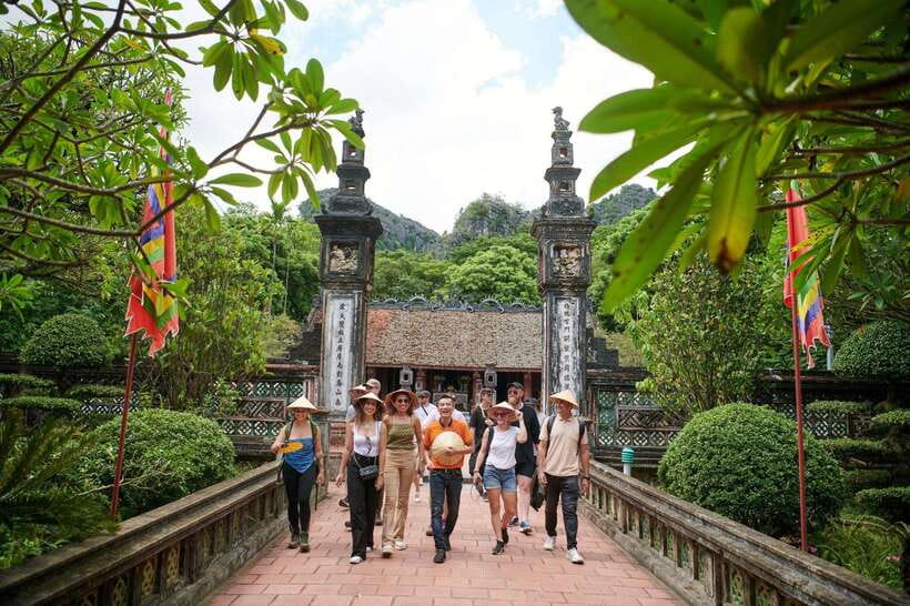 From Hanoi: Trang An, Hoa Lu & Mua Cave Full-Day Luxury Tour - Cycling through villages near Hoa Lu