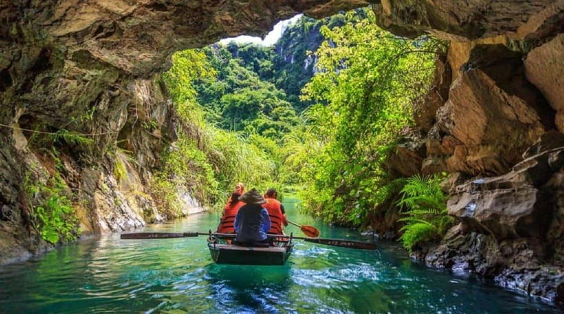 From Hanoi: Trang An, Hoa Lu & Mua Cave Full-Day Luxury Tour - Trang An by sampan, through caves and green water