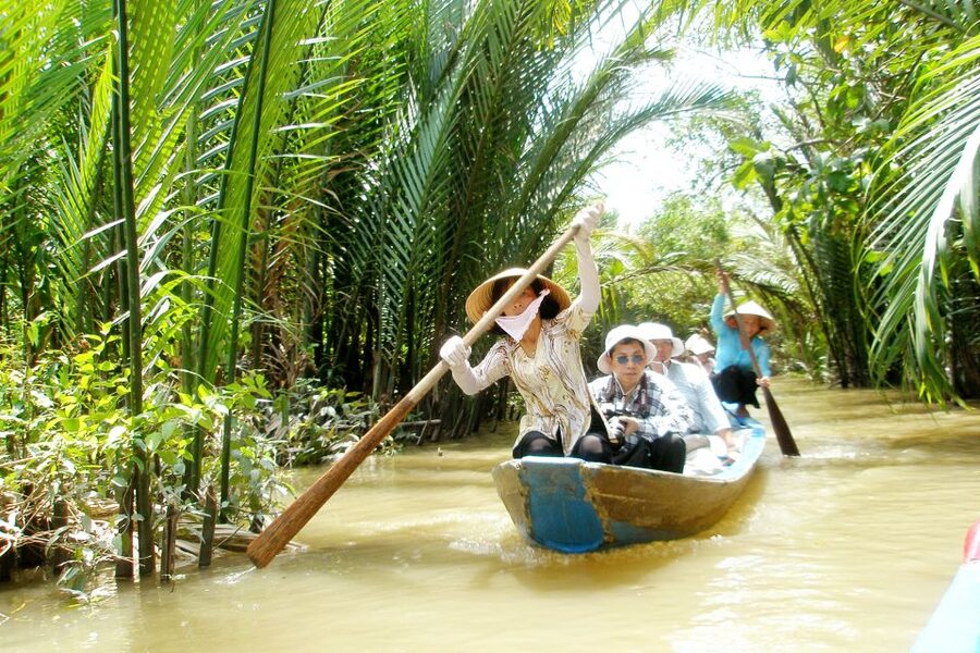 From Ho Chi Minh City: Mekong Delta VIP Tour by Limousine - Walking through the village and tasting local products