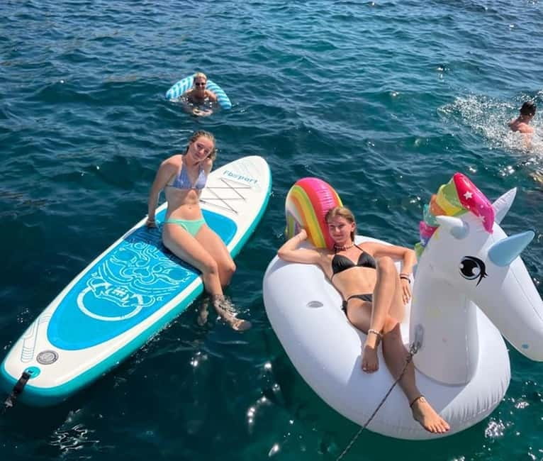 From Palma: Luxury Catamaran Group Tour with Tapas & Drinks - Tapas, welcome drinks, and extra costs