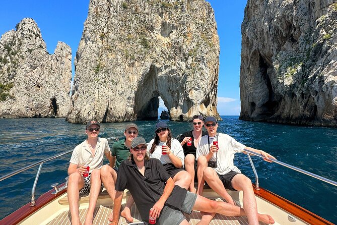From Sorrento or Positano: Capri Island Private Boat VIP Tour - The first views: Marina Grande and a Roman villa