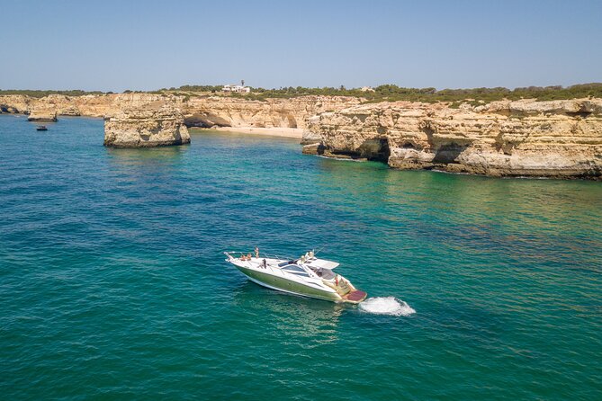 Full-Day Private Cruise in the Algarve Coast by Luxury Yacht - A famous beach and the Alfanzina Lighthouse