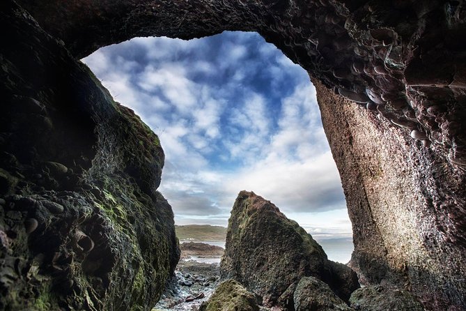 Giant's Causeway Tour from Belfast - Luxury Bus + Castles Tour - Dunluce Castle above the sea