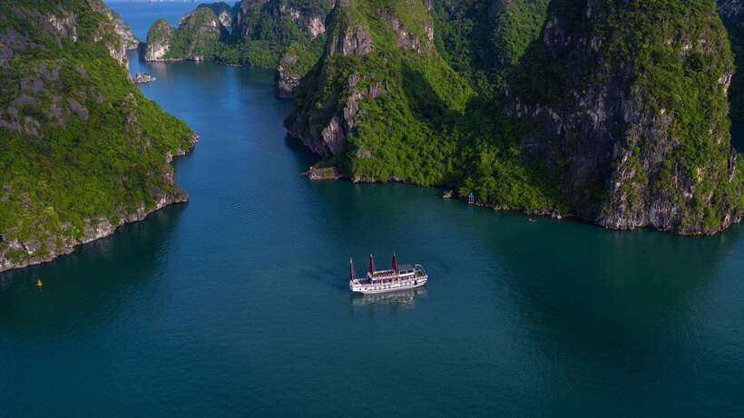 Ha Long Bay - Bai Tu Long Bay Luxury Boat Tour & Transfer - Titop Island for a 360-degree view