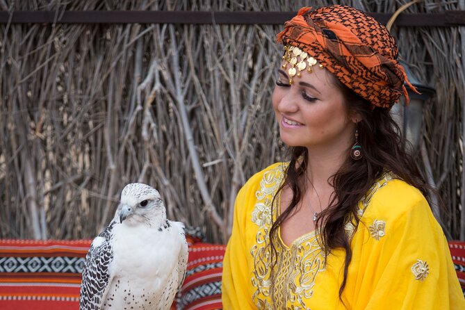 High Red Dunes with Camel Ride, Sandboarding, Falcon Show and VIP BBQ Dinner - The guide can shape the whole day