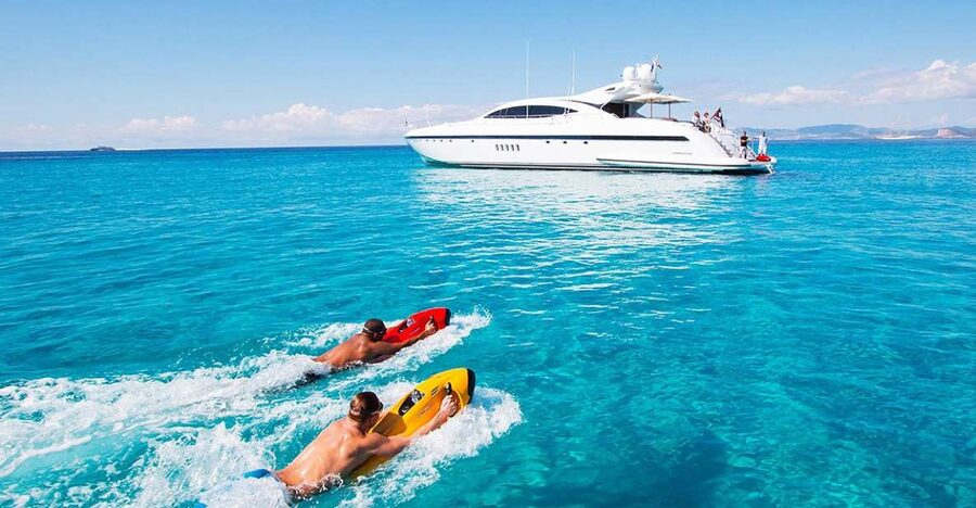Ibiza: Beach and Cave Boat Tour with Luxury Water Toys - Snorkeling beneath the clear water