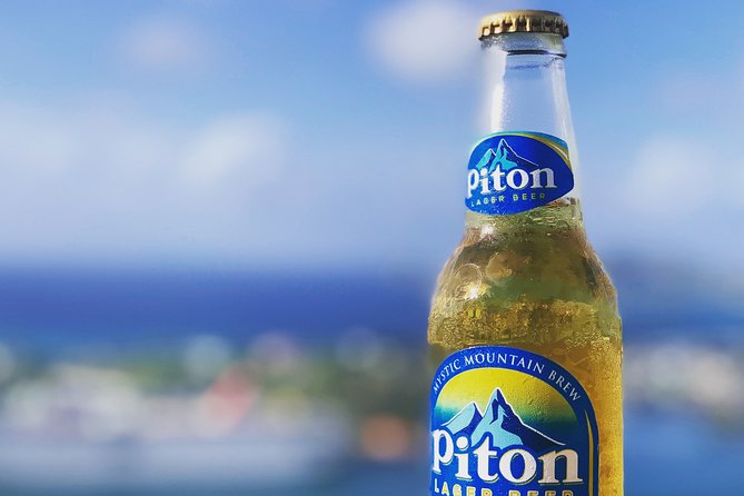 International Airport (UVF) Transfers & Fast track VIP Service(Roundtrip) - Snacks, water, and Piton beer
