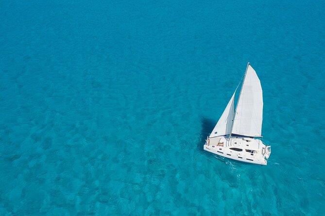 Isla Mujeres Luxury Sailing: Adults Only or Family Friendly - Boarding the catamaran from Cancun