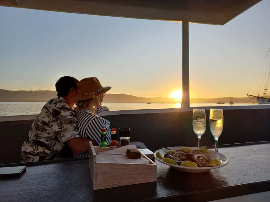 Knysna: Wine & Oyster Luxury Lounger Sunset Cruise - The Knysna Estuary at sunset