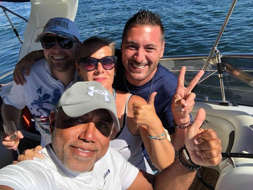 Lagos: Luxury Yacht Charter with Drinks & Tapas - Following the Algarve coast toward Ponta da Piedade