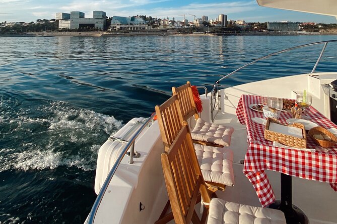 Lisbon: Catamaran Luxury Sunset and Wine Tour - Portuguese wine and the evening pace
