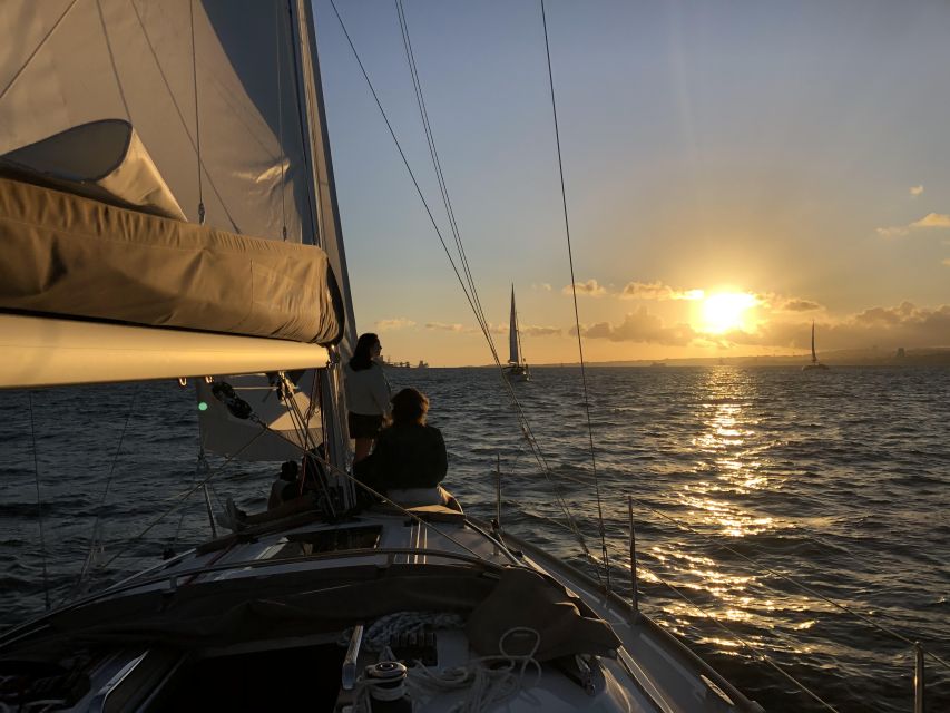 Lisbon: Luxury Private Sailing Boat Cruise on River Tagus - Passing beneath the 25th April Bridge