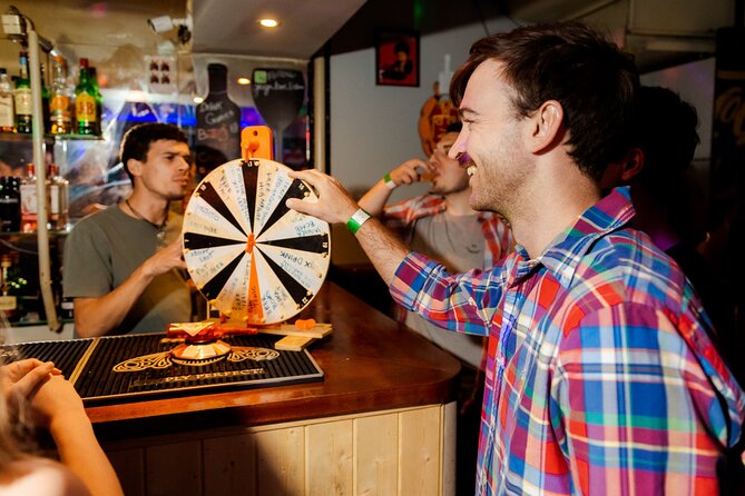 Lisbon: Pub Crawl with Open Bar, Shots & VIP Club Entry - Pink Street and the changing pace of the night