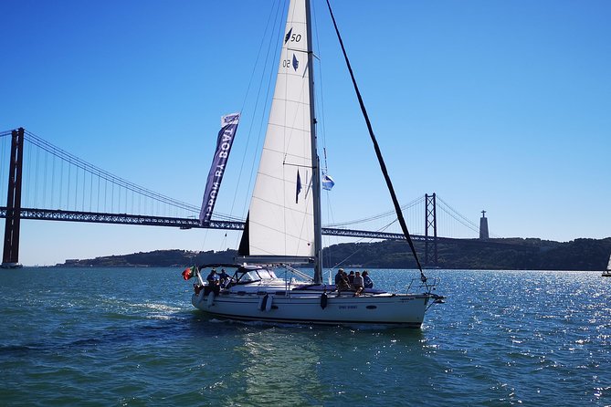 Lisbon Sailing Tour on a Luxury Sailing Yacht with 2 Drinks - Sailing beneath the 25 de Abril Bridge
