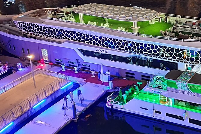 Lotus Mega Yacht Luxury Cruise with Live DJ, Dinner & Transfers - Palm Jumeirah and Atlantis from the water