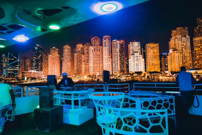 Lotus Mega Yacht Luxury Cruise with Live DJ, Dinner & Transfers - Pool, jacuzzi, decks, and VIP seating